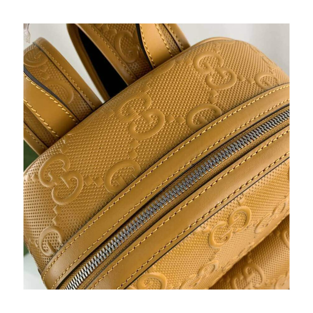 Gucci GG Embossed Backpack in Yellow Leather