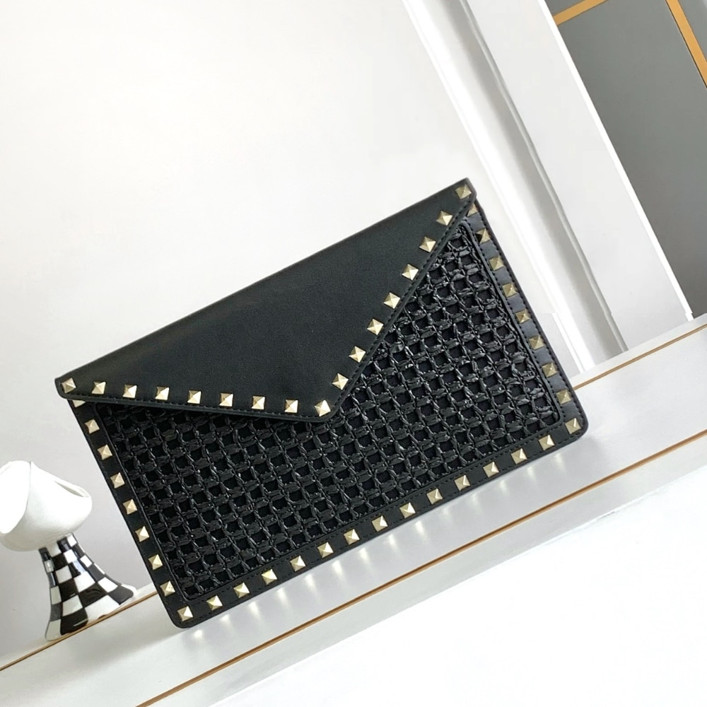 Valentino Garavani Rockstud Raffia Clutch Bag In Black 28Cm