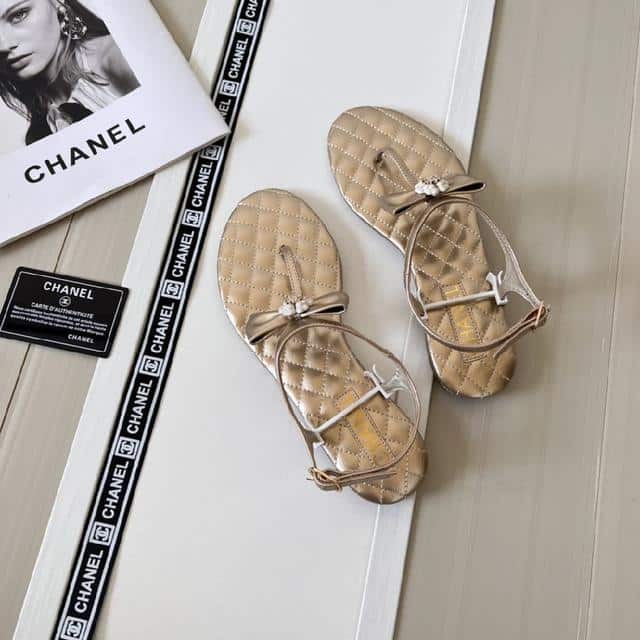 Chanel Gold Quilted Leather With White Camellia Cc Logo Bow Thong Sandals