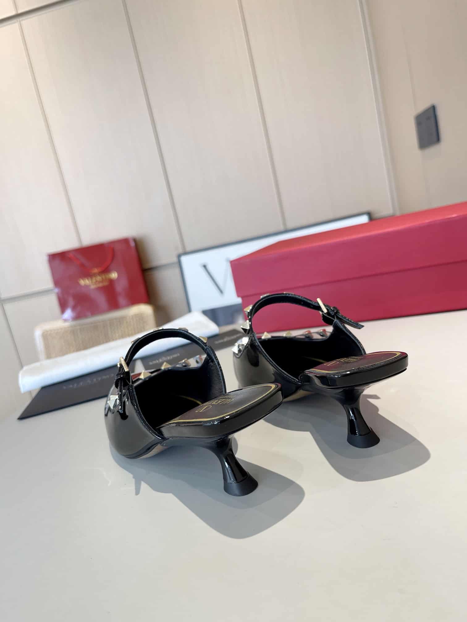Valentino Garavani Rockstud Asymmetric Patent Leather Mules Black