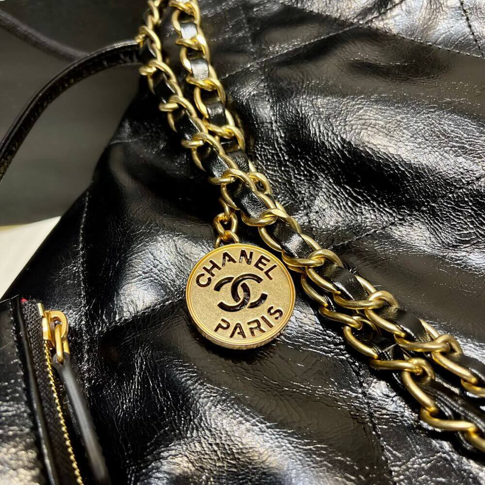 Chanel 22 Small Handbag Shiny Calfskin Black Gold