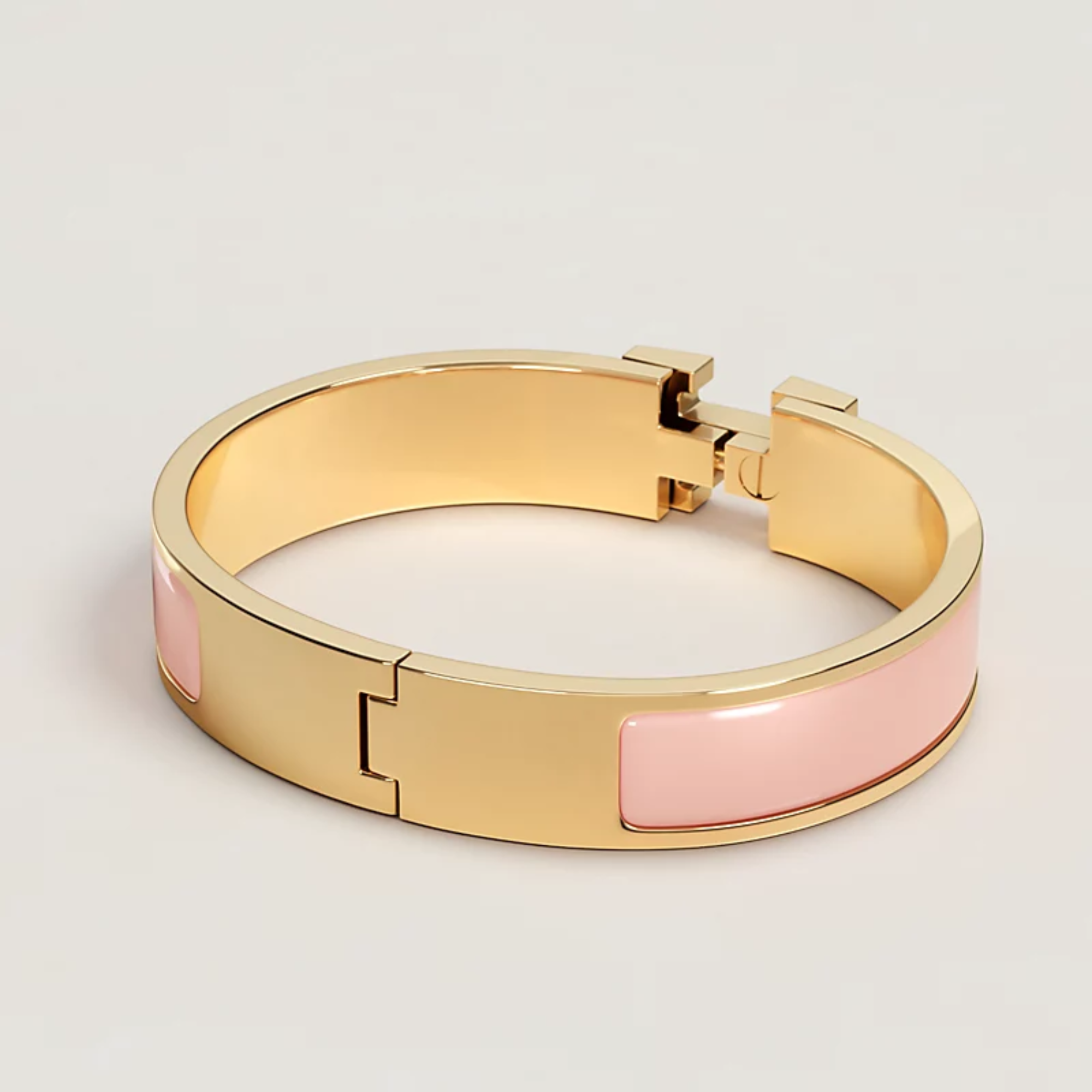 Hermes Clic H Bracelet in Gold and Pink