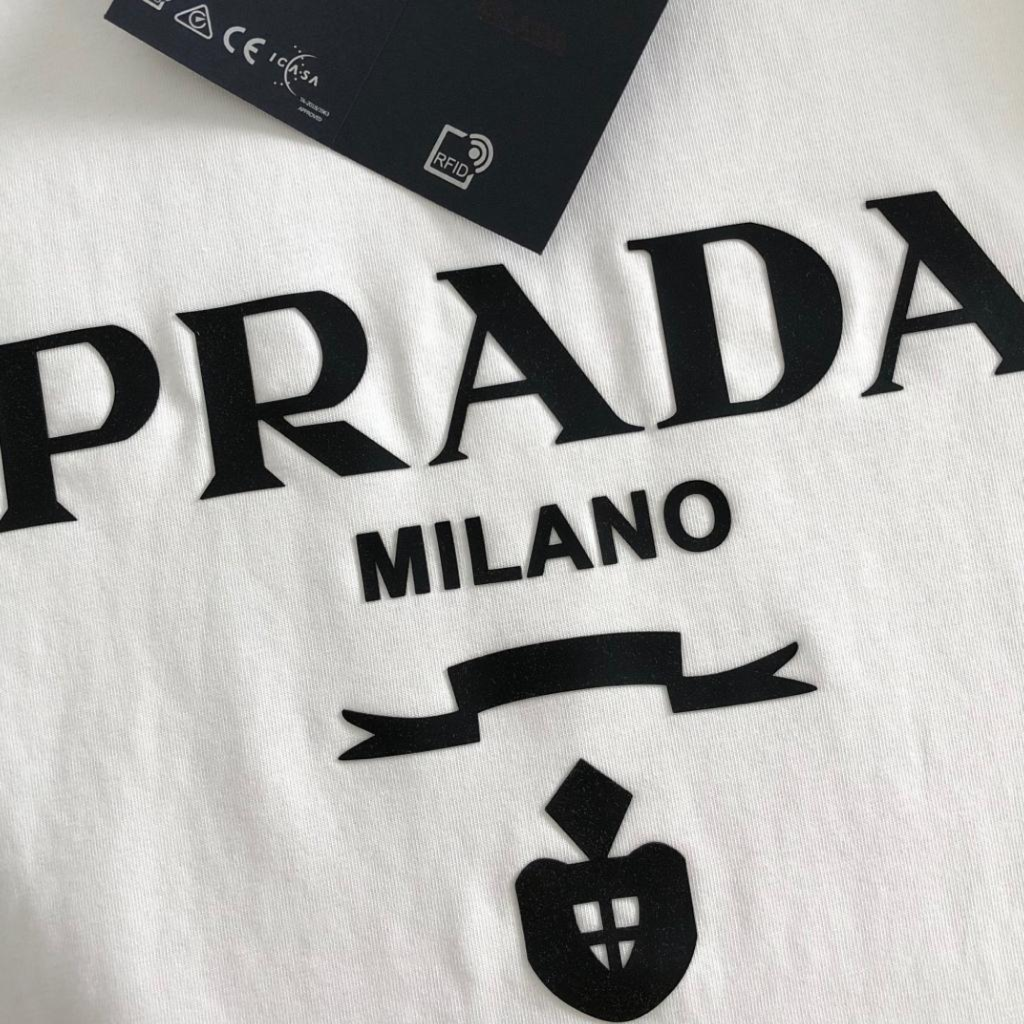 Prada Milano White Black Logo.