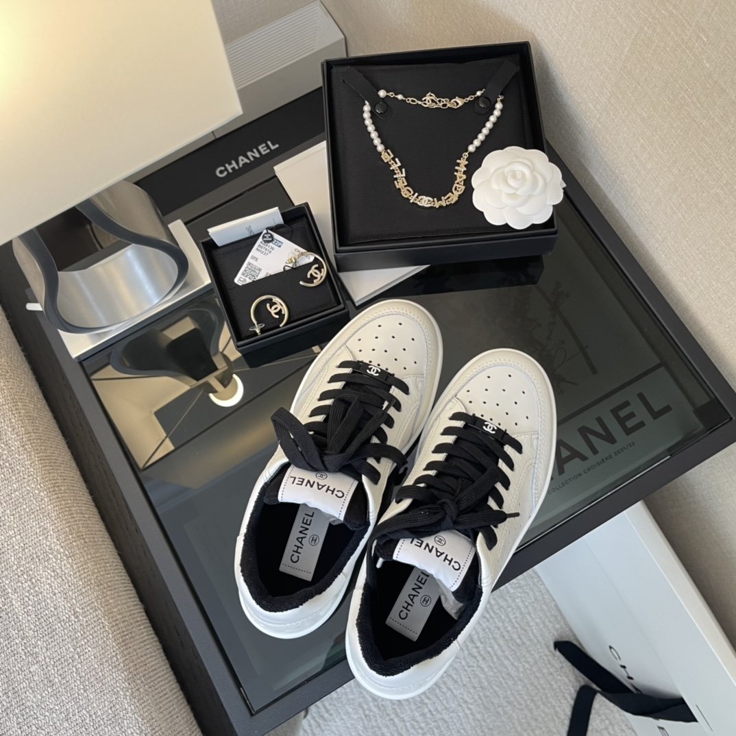 Chanel White/Black Leather Logo Sneakers