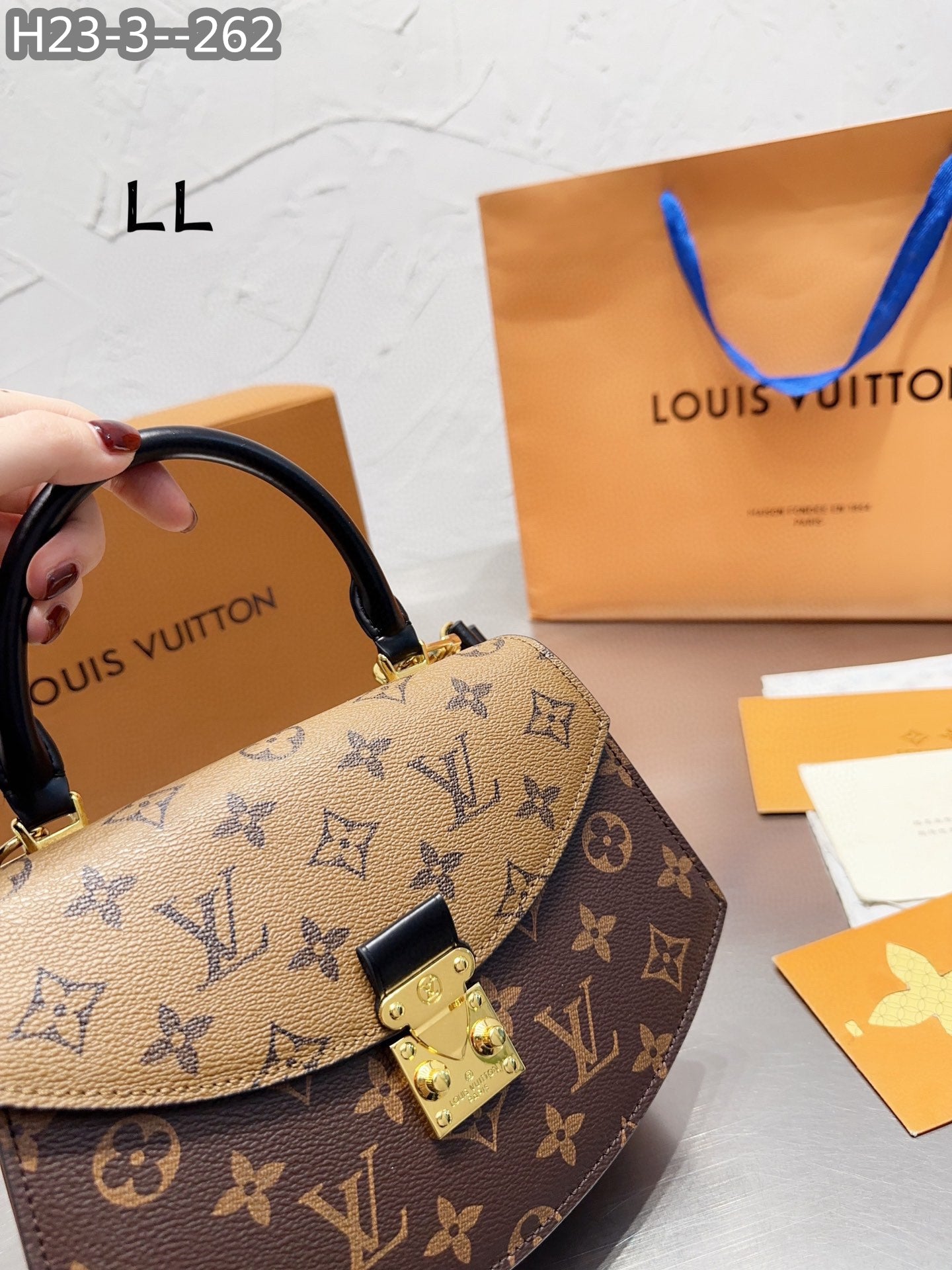 Louis Vuitton Tilsitt Bag Brown 23Cm M46548