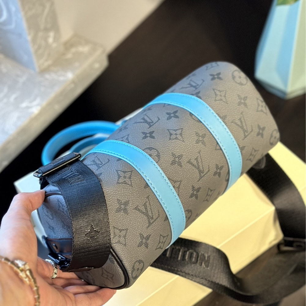 Louis Vuitton Keepall Bandoulière 25 Monogram Eclipse Reverse Coated Canvas Turquoise 25cm M11645