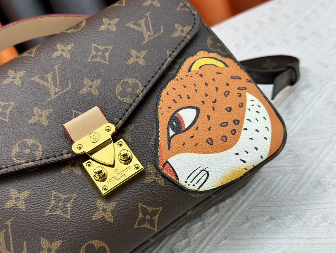 Louis Vuitton Pochette M Tis Monogram Coated Canvas 25Cm M47203