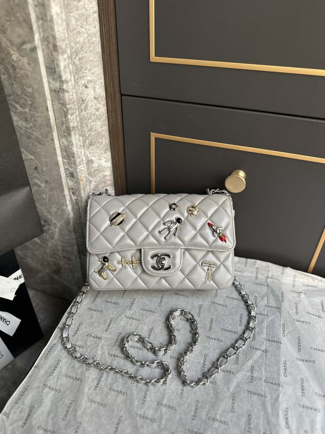 Spring-Summer 2026 Space Mission Limited Edition White Quilted Lambskin Classic Flap Bag with Silver-Tone Hardware & Space Charms