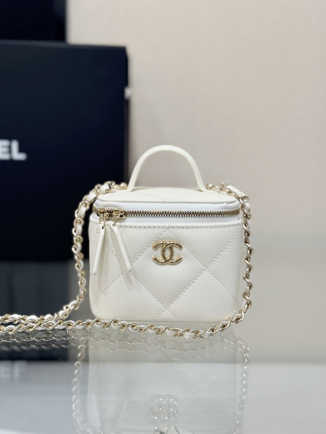 Mini Top Handle Vanity Case (AS5993) in White Quilted Grained Calfskin (Caviar) with Antique Gold-Tone Hardware