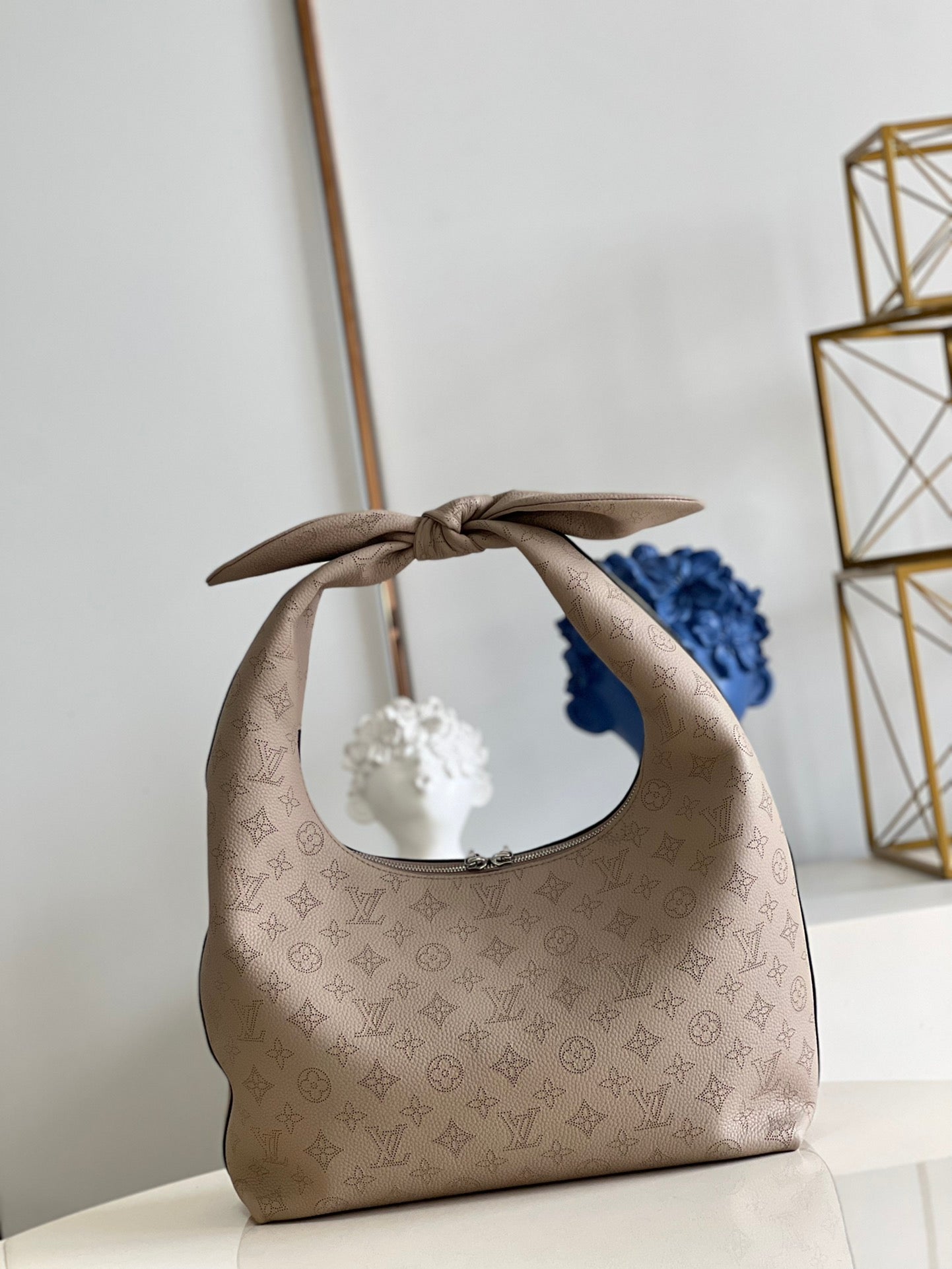 Louis Vuitton Why Knot Mm Beige