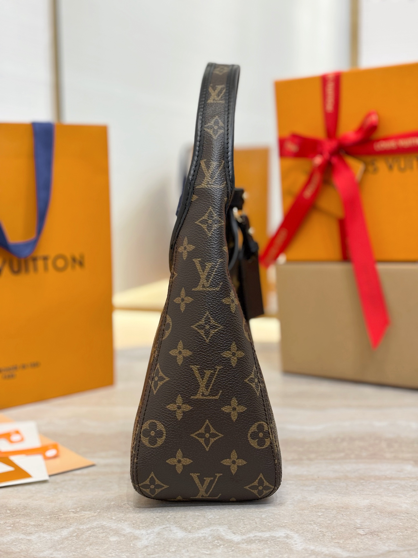 Louis Vuitton The Drop Pm Monogram Canvas M12940