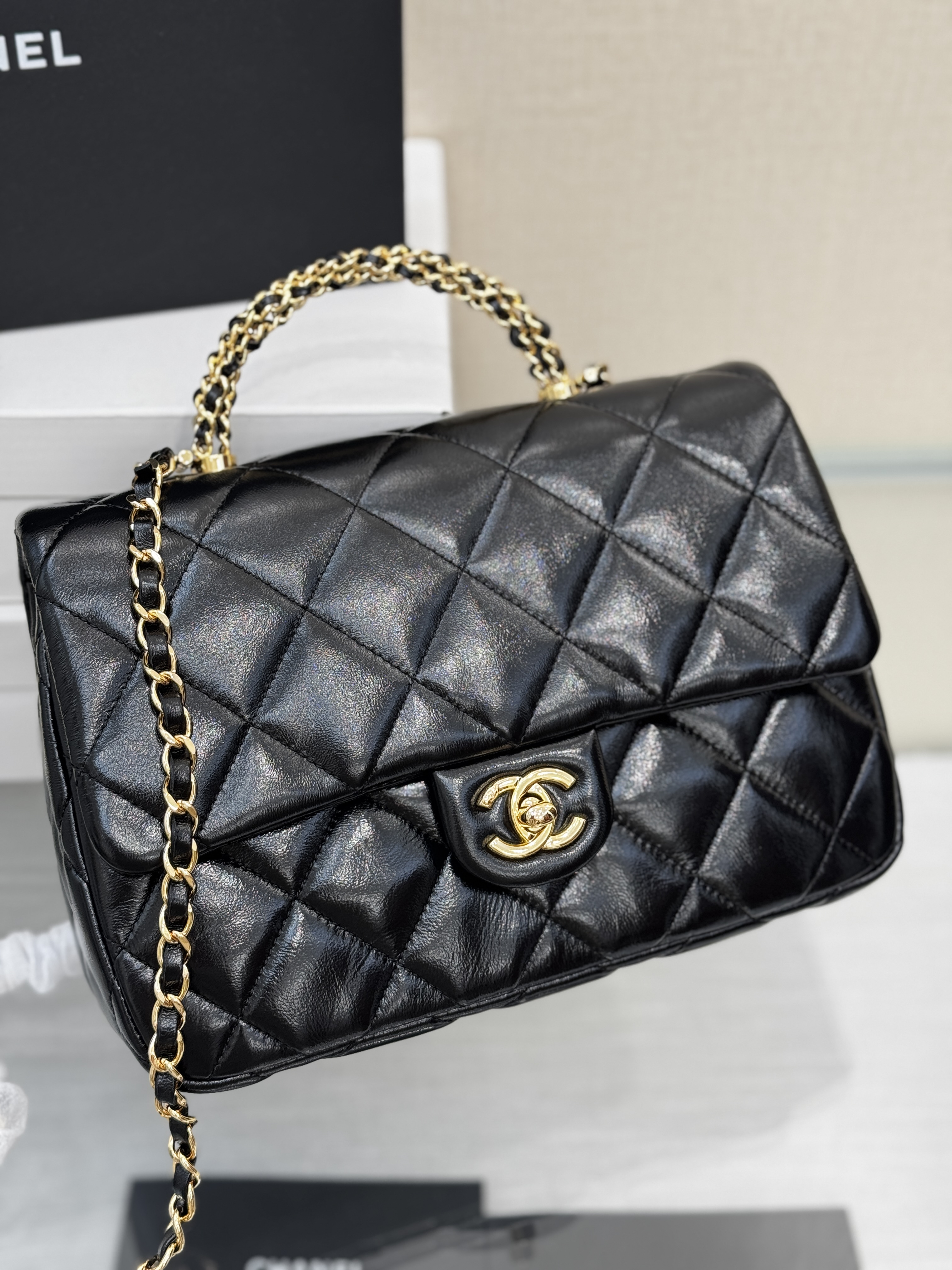 24B Classic Flap Large with Twist Handle in Black Waxed Lambskin with Gold-Tone Hardware (Model AS5166)