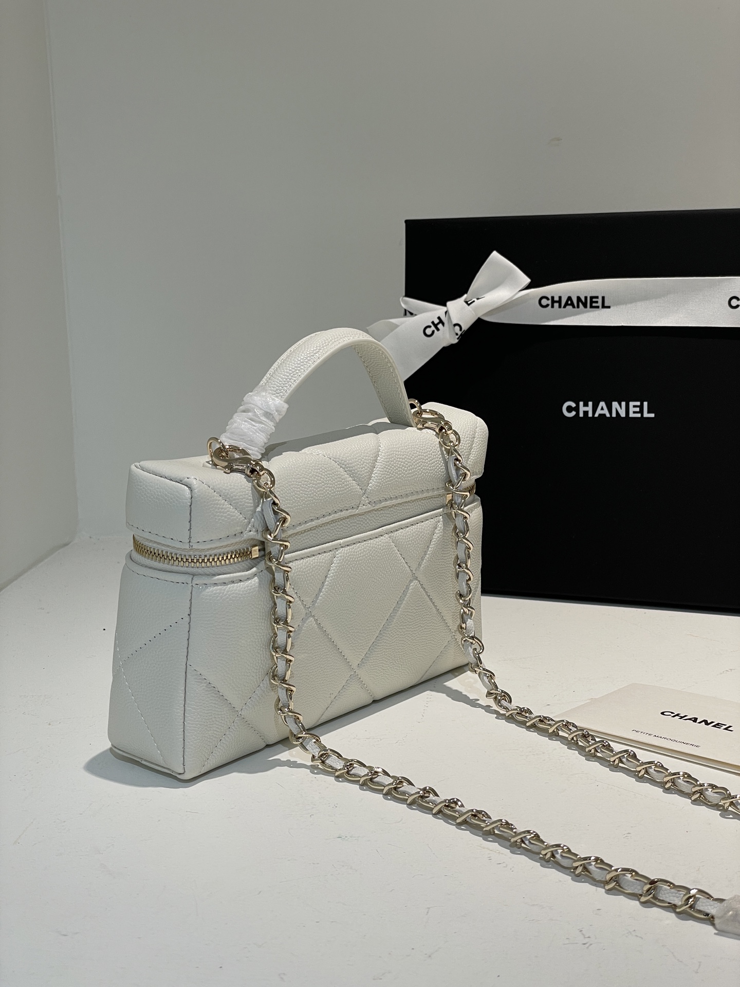 White Quilted Caviar Calfskin Vanity Case with Top Handle and Gold-Tone Chain Strap