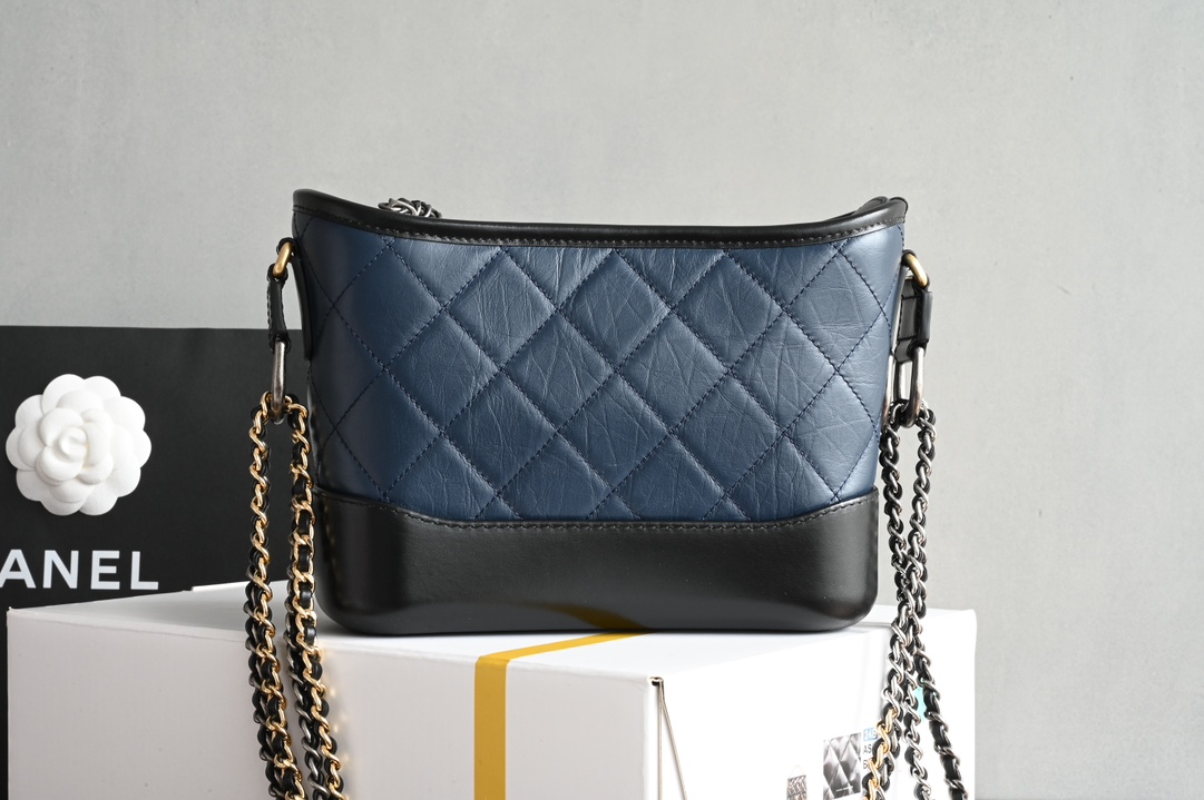 Small Gabrielle Hobo Bag in Navy Blue and Black Quilted Aged Calfskin with Gold-Tone and Silver-Tone Metal (Model A91810)