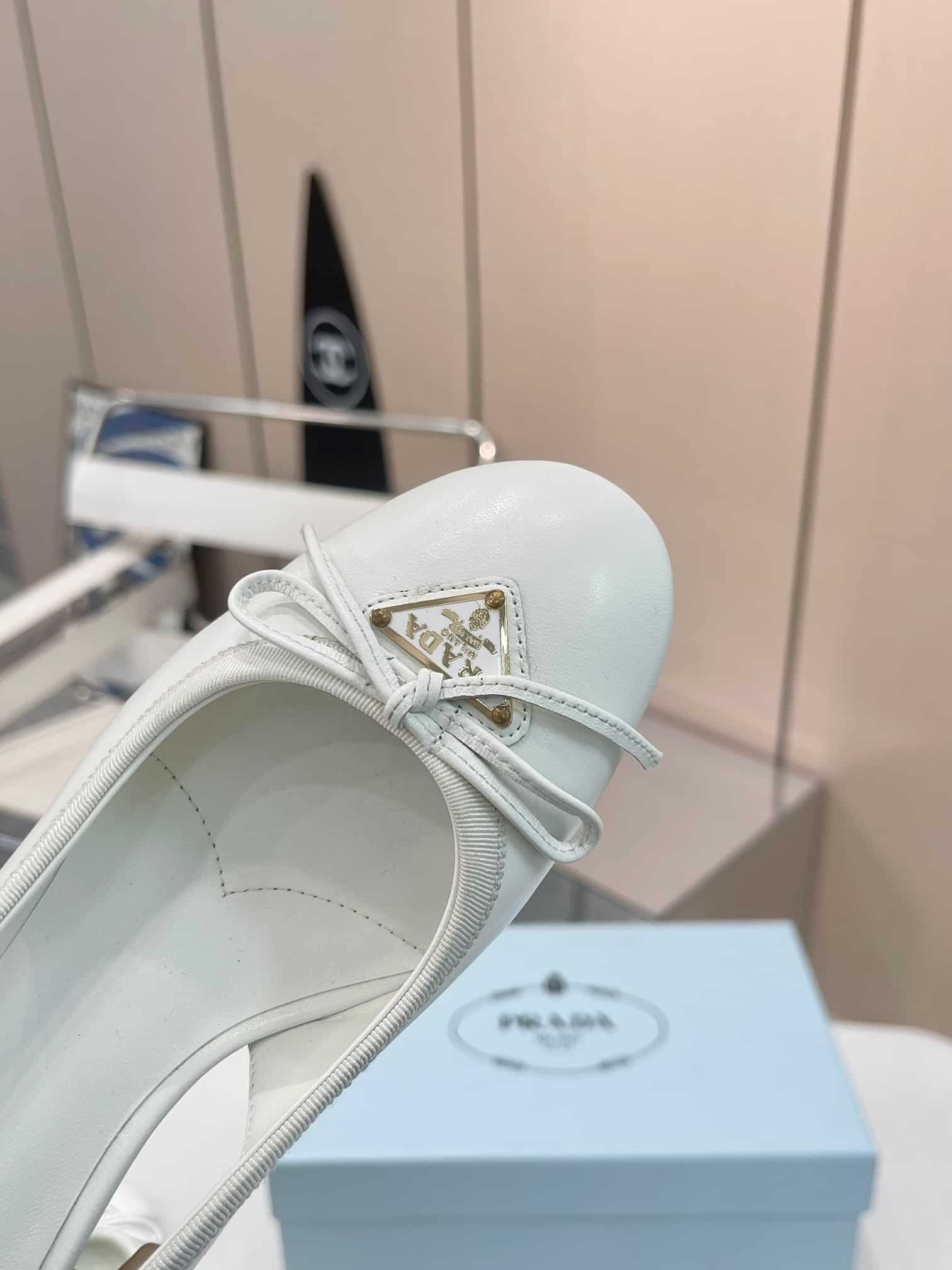 Prada Triangle Logo Bow Slingback Pump In White