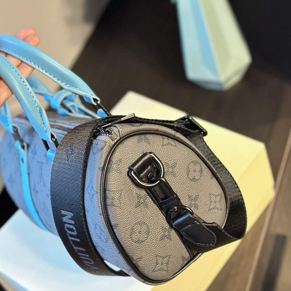 Louis Vuitton Keepall Bandoulière 25 Monogram Eclipse Reverse Coated Canvas Turquoise 25cm M11645