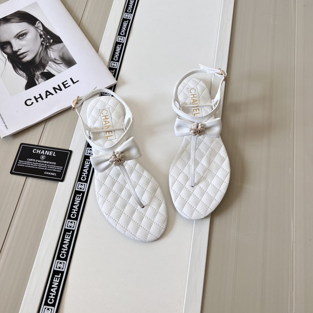 Chanel White Quilted Leather With White Camellia Cc Logo Bow Thong Sandals