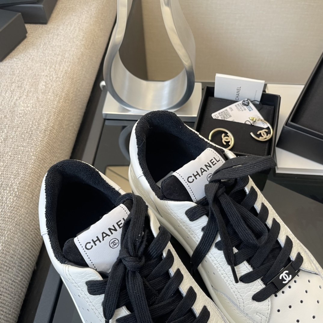 Chanel White/Black Leather Logo Sneakers