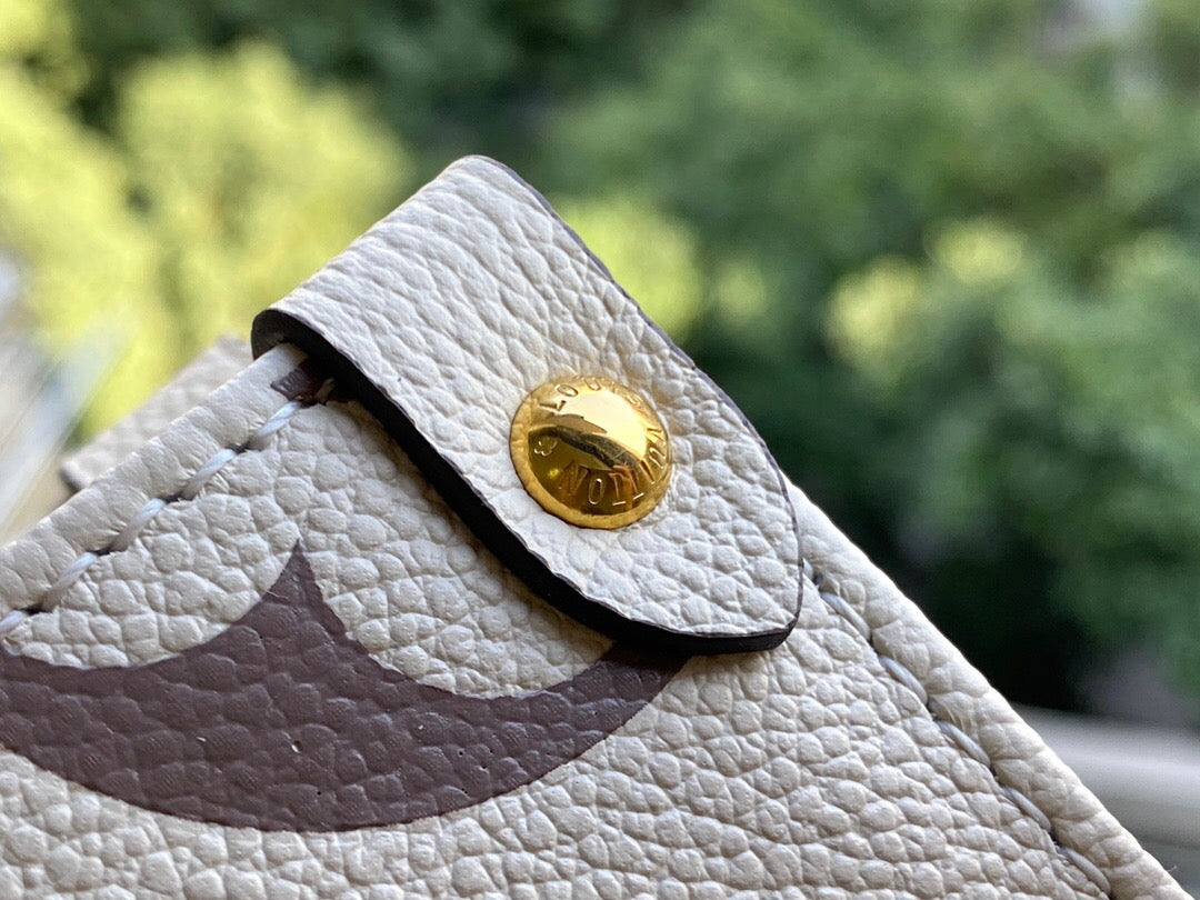 Louis Vuitton Empreinte Onthego Pm White 25Cm M45654