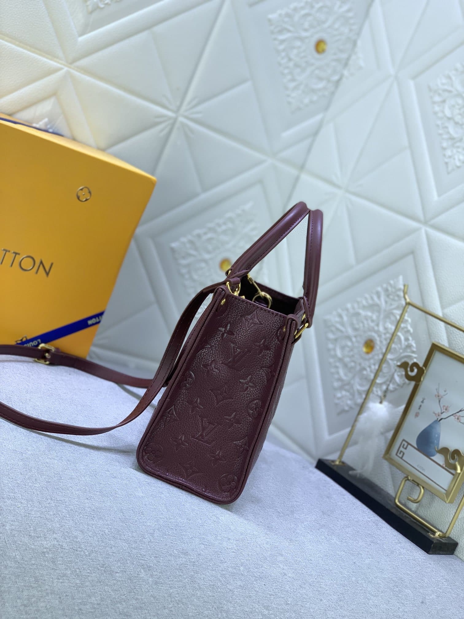 Louis Vuitton Onthego MM Monogram Empreinte Wine Red 25Cm M46601