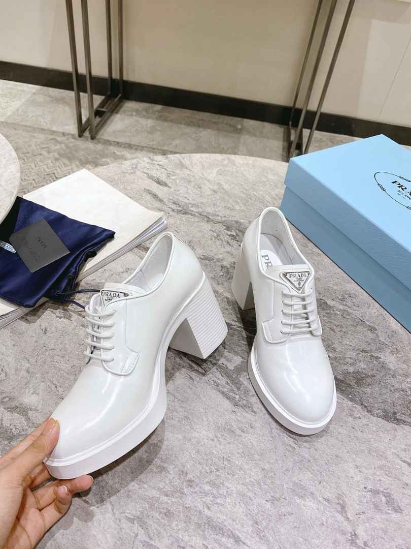 Prada Heeled Brushed Leather Lace-Ups White