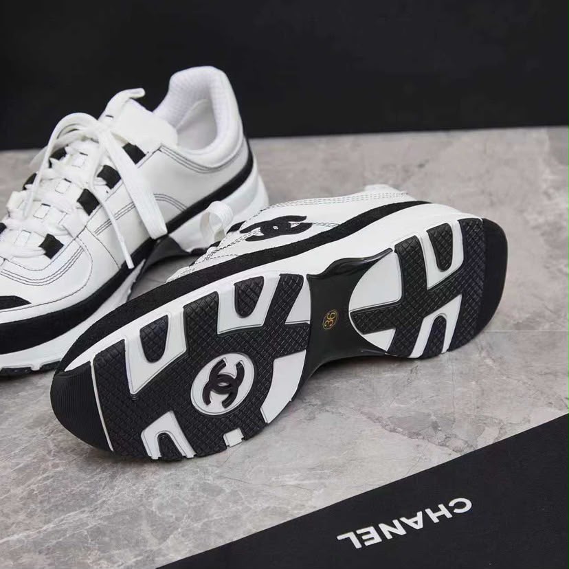 Chanel Lace Up Sneakers White Black