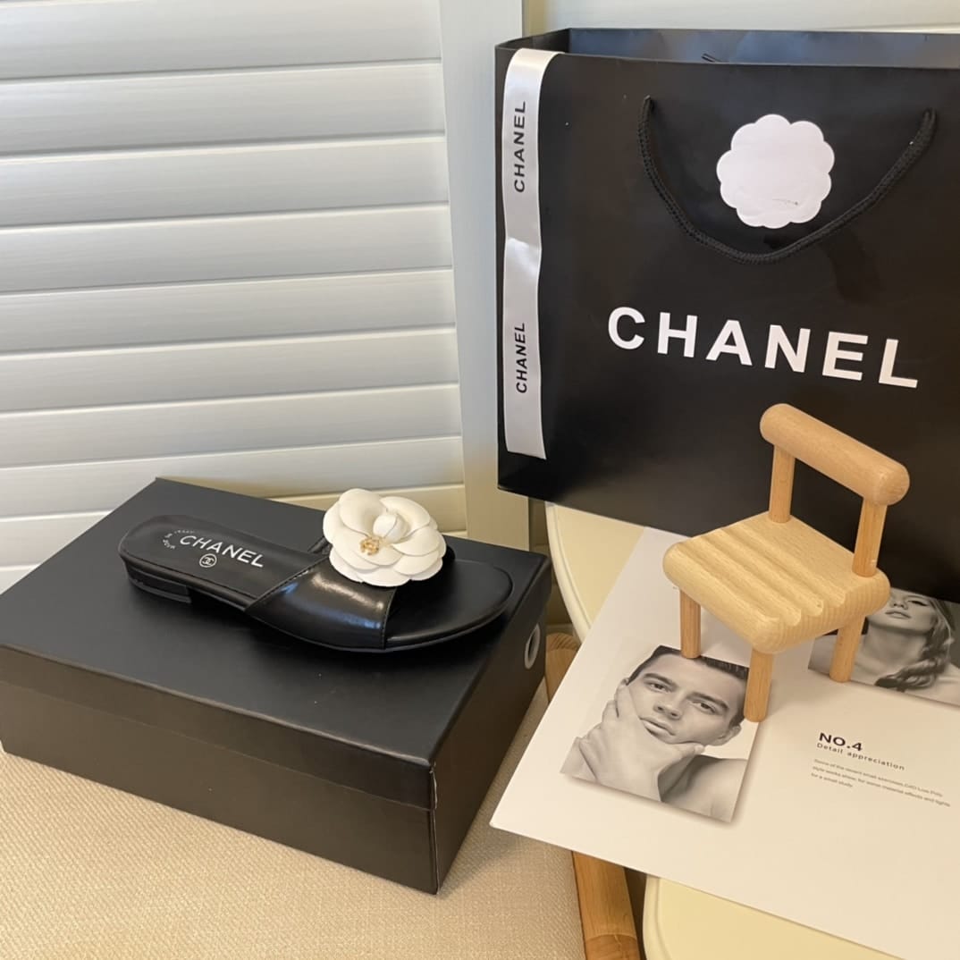Chanel White Camellia Slides Black