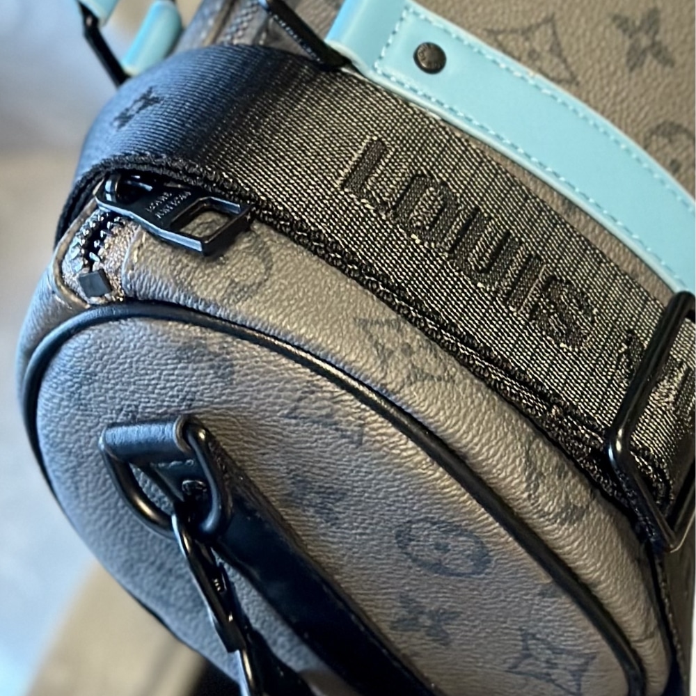 Louis Vuitton Keepall Bandoulière 25 Monogram Eclipse Reverse Coated Canvas Turquoise 25cm M11645