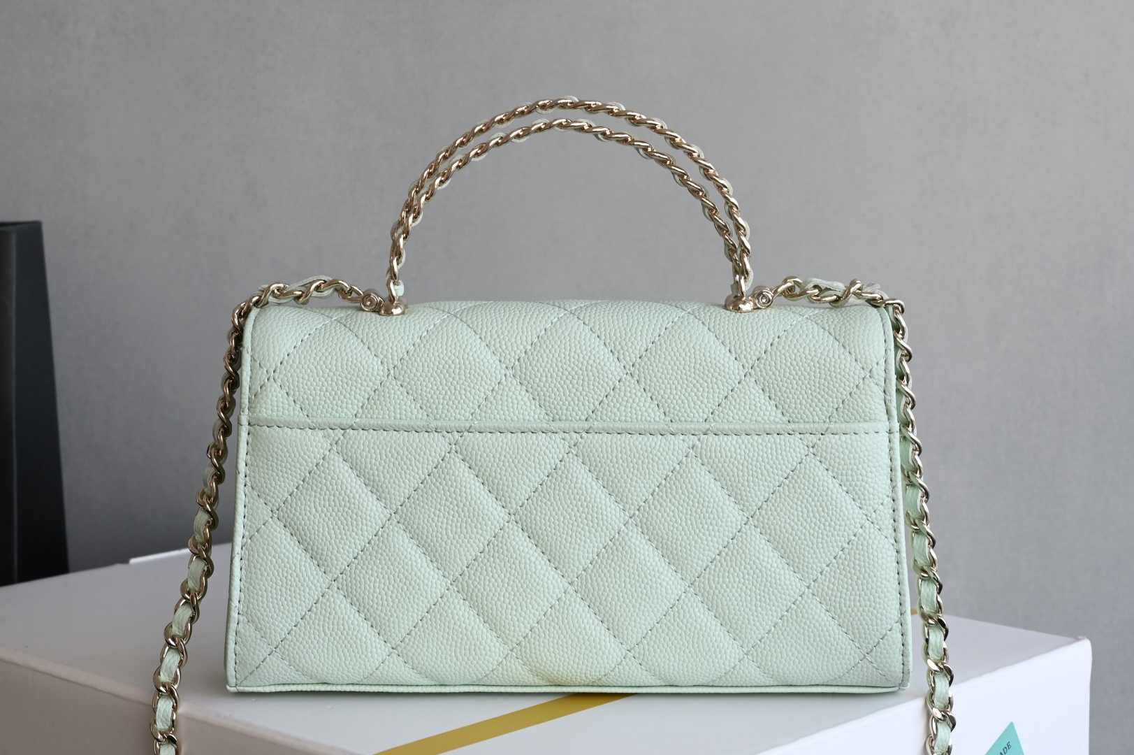 25S Top Handle Kelly Clutch with Chain in Mint Green Caviar Leather with Light Gold-Tone Hardware (Model AS4711)