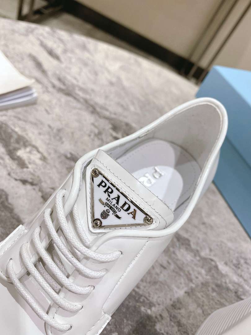 Prada Heeled Brushed Leather Lace-Ups White