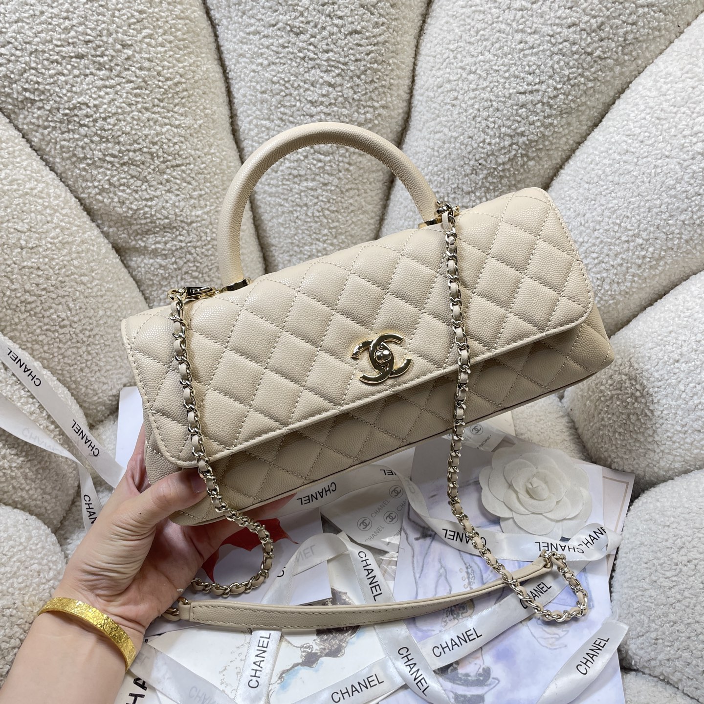 Spring-Summer 2026 Light Beige Quilted Caviar Calfskin Top Handle Flap Bag with Gold-Tone Hardware
