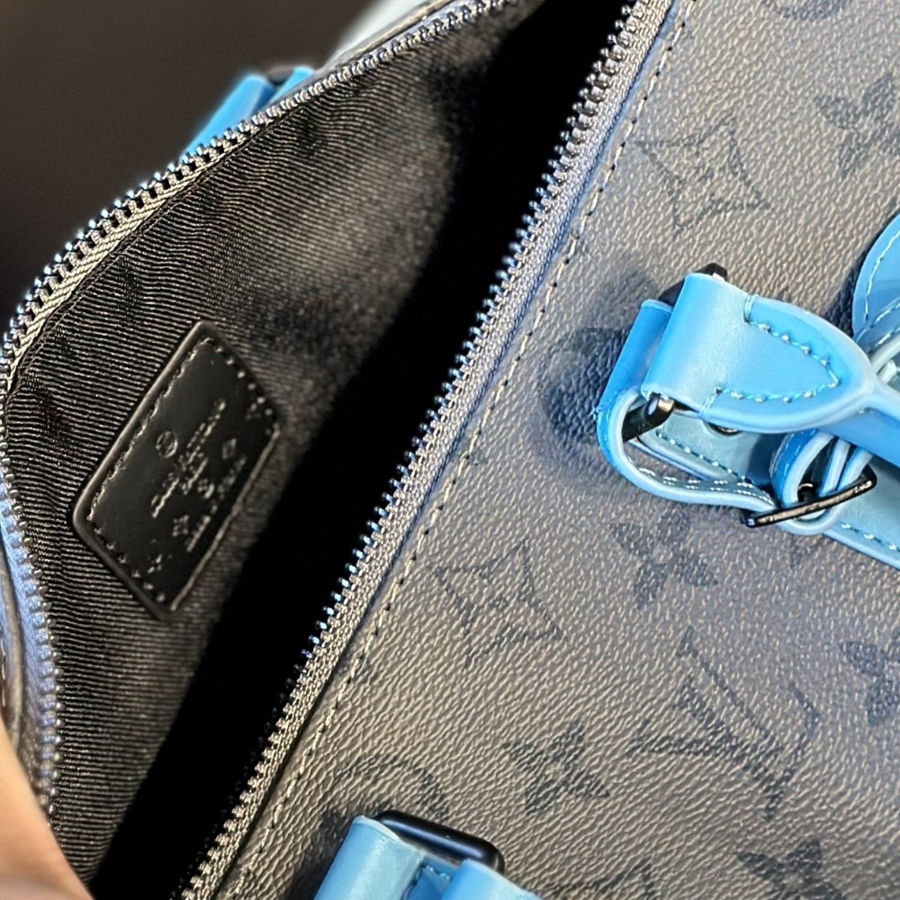 Louis Vuitton Keepall Bandoulière 25 Monogram Eclipse Reverse Coated Canvas Turquoise 25cm M11645