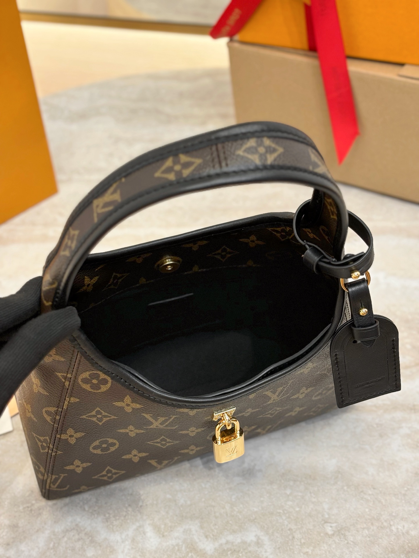 Louis Vuitton The Drop Pm Monogram Canvas M12940