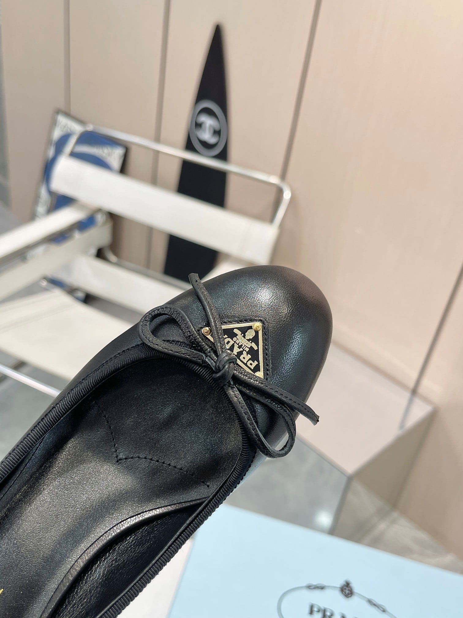 Prada Triangle Logo Bow Pump In Black