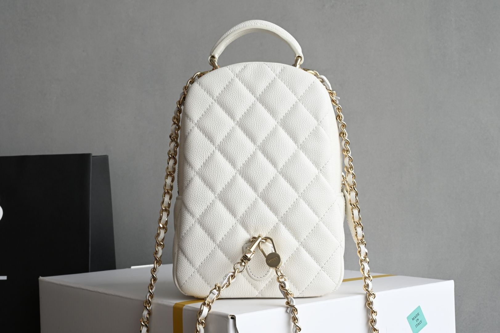 24C Mini Backpack in White Quilted Grained Calfskin (Caviar) with Light Gold-Tone Hardware (Model AP3753)
