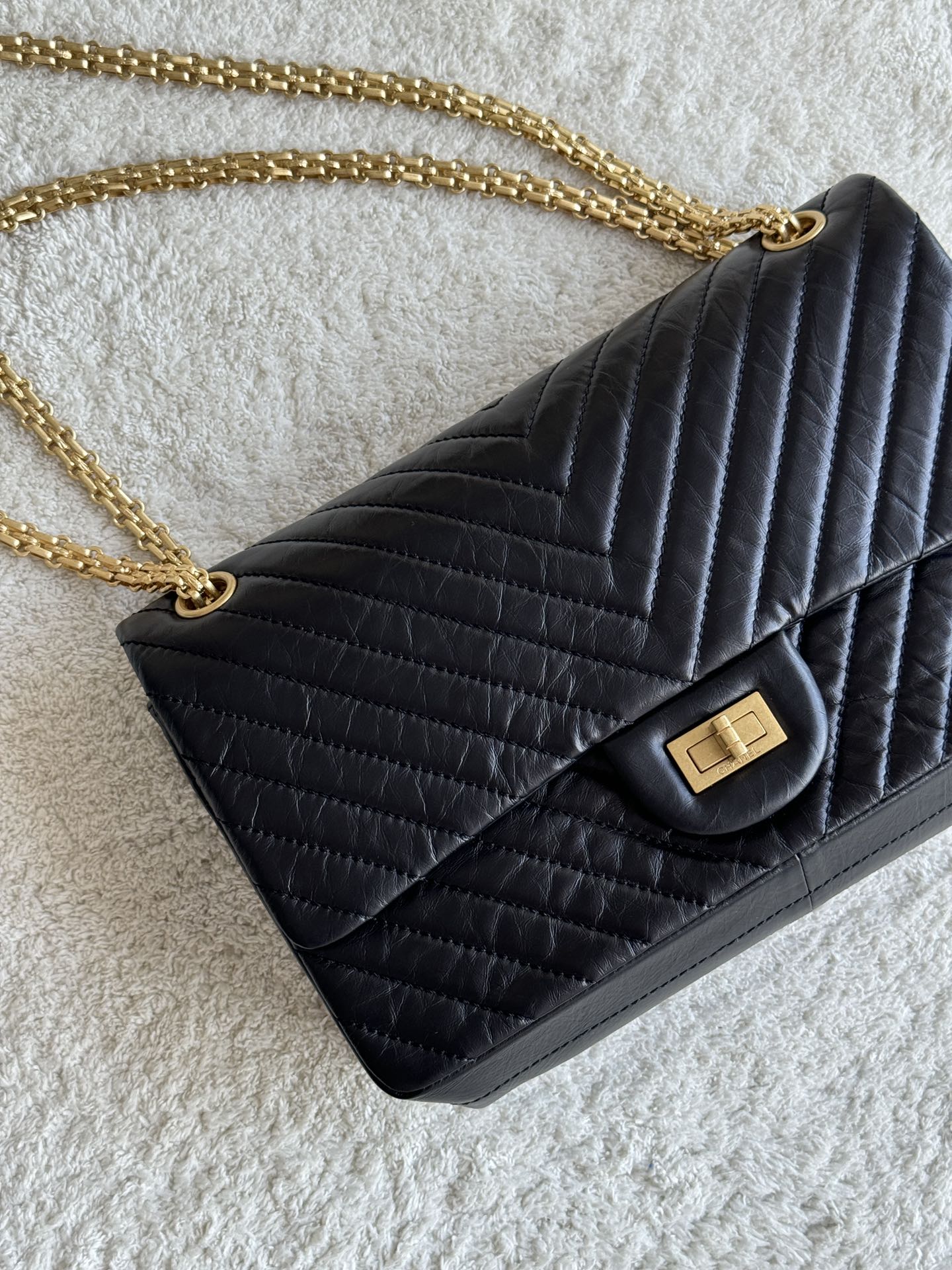 2.55 Reissue 227 Jumbo Flap Bag in Black Aged Calfskin with Chevron Quilting and Gold-Tone Hardware