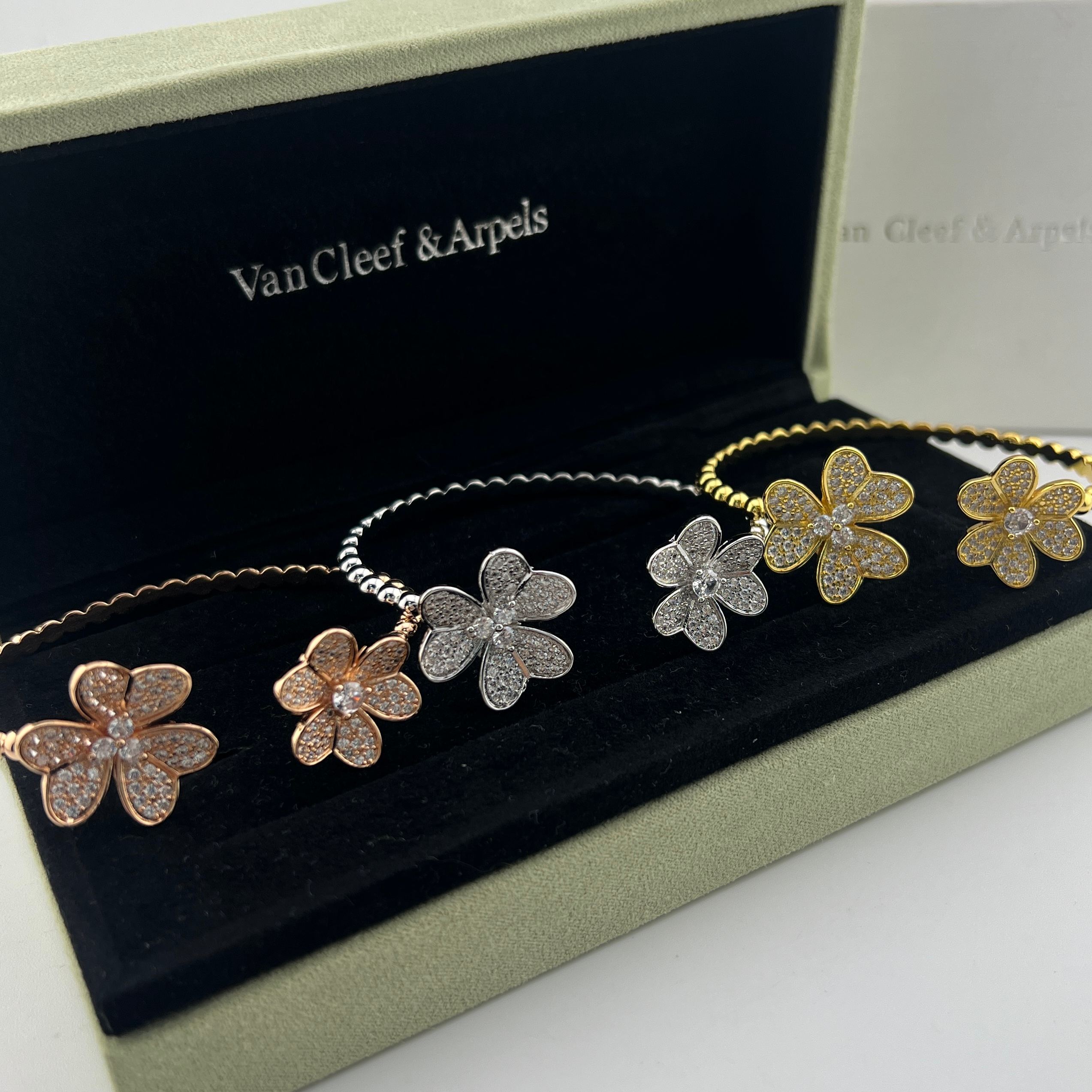 Pavé-set diamond four-leaf clover bracelet