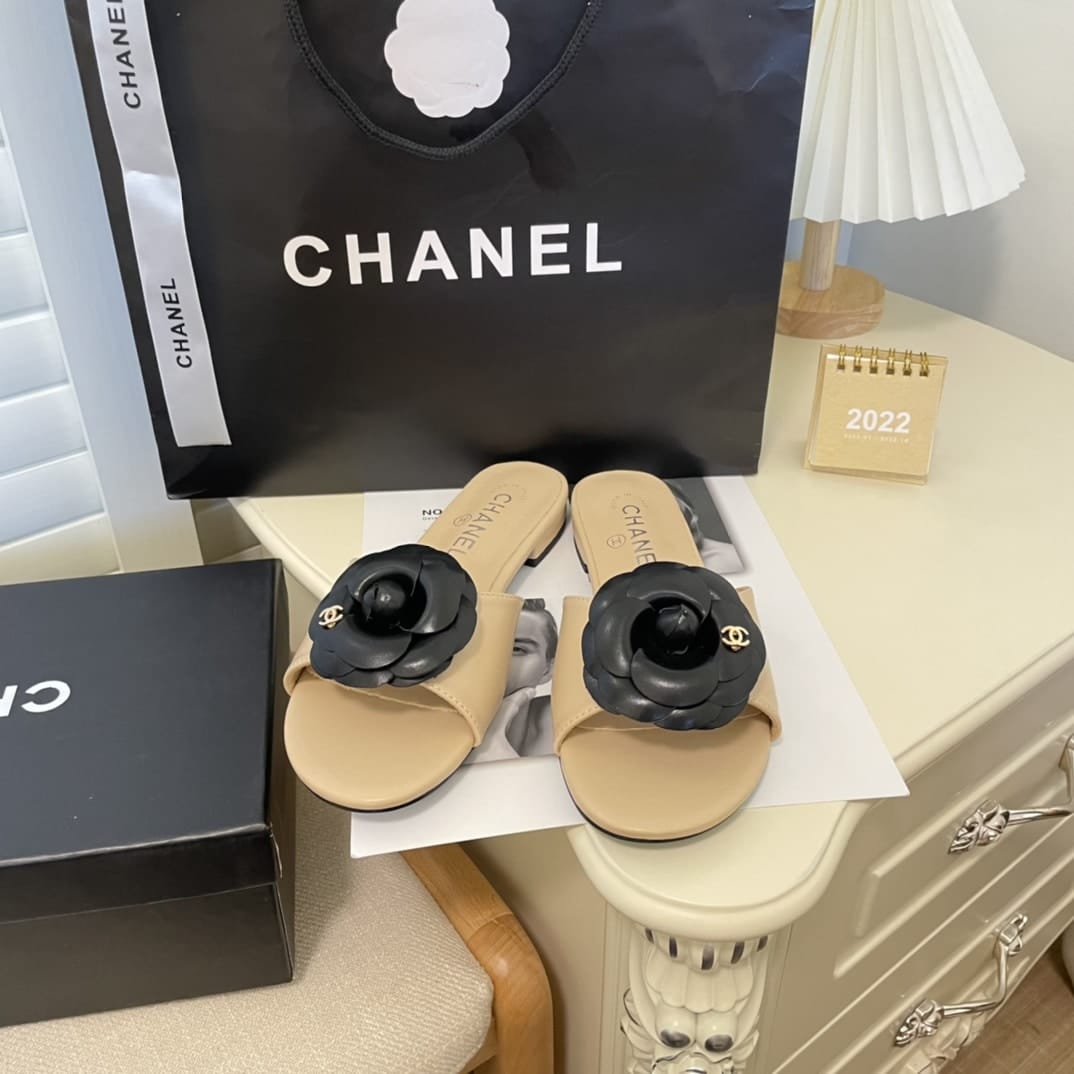 Chanel Black Camellia Slides Beige