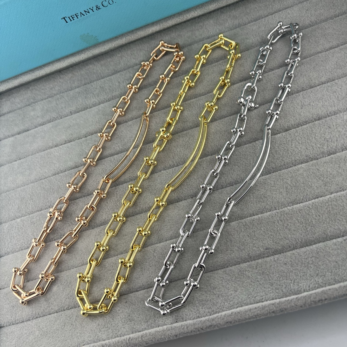 Elongated double-U horseshoe necklace