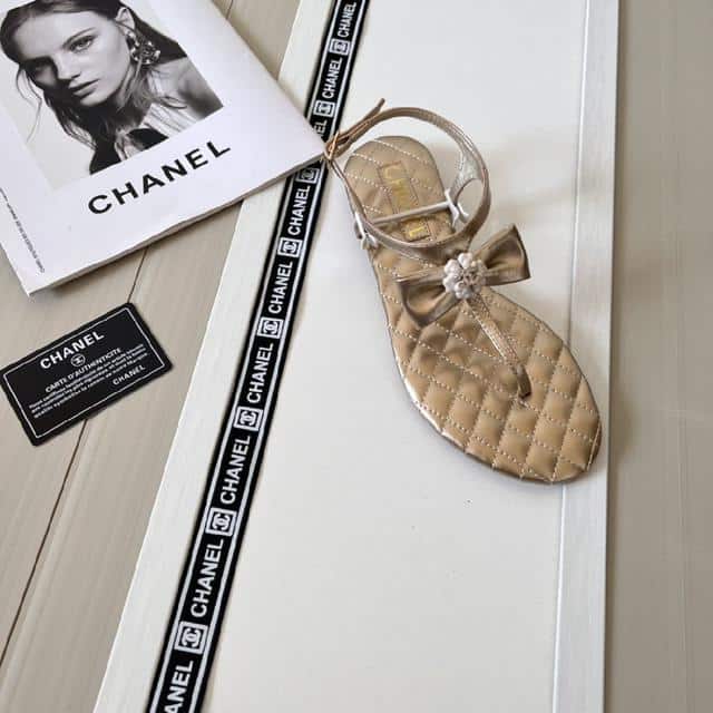 Chanel Gold Quilted Leather With White Camellia Cc Logo Bow Thong Sandals