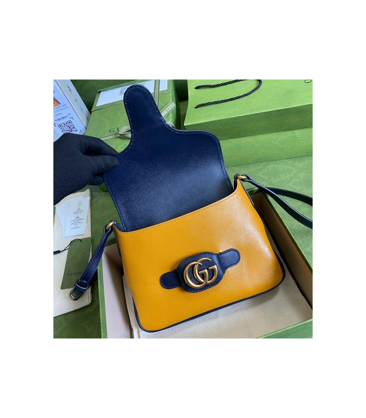 Gucci Small Messenger Bag with Double G 648934