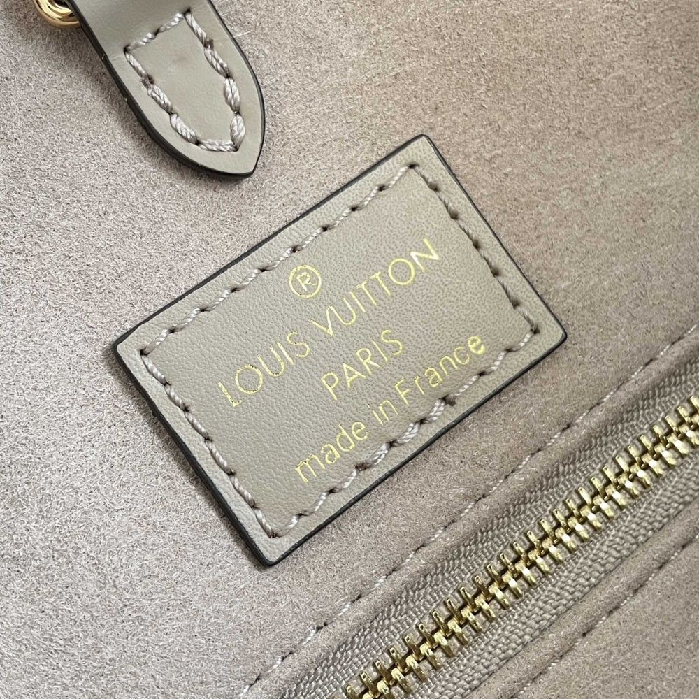 Louis Vuitton Onthego MM Monogram Empreinte Leather Tote Bag Dove Cream 35cm M45494