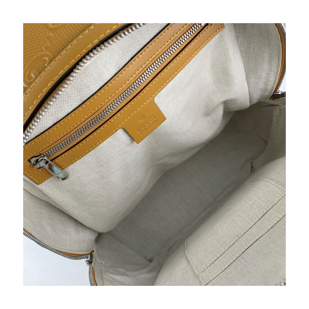 Gucci GG Embossed Backpack in Yellow Leather