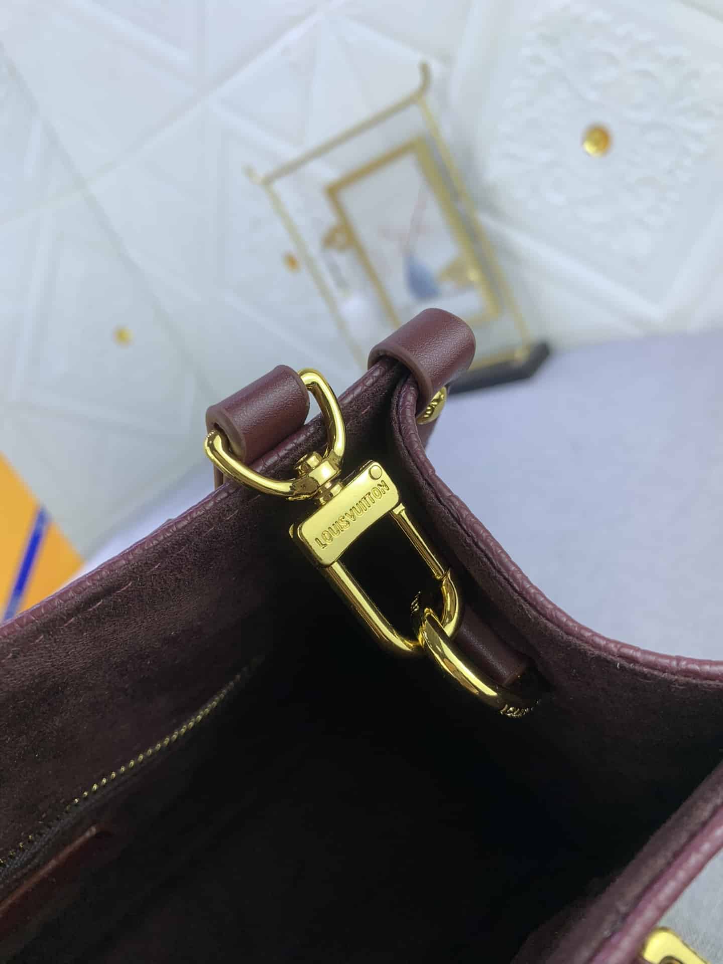 Louis Vuitton Onthego MM Monogram Empreinte Wine Red 25Cm M46601