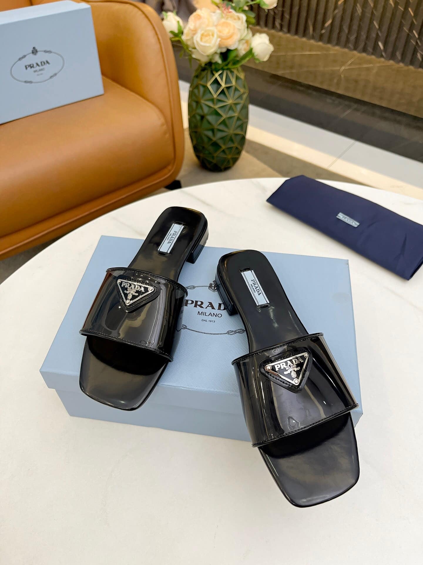 Prada Logo Plaque Slip On Black