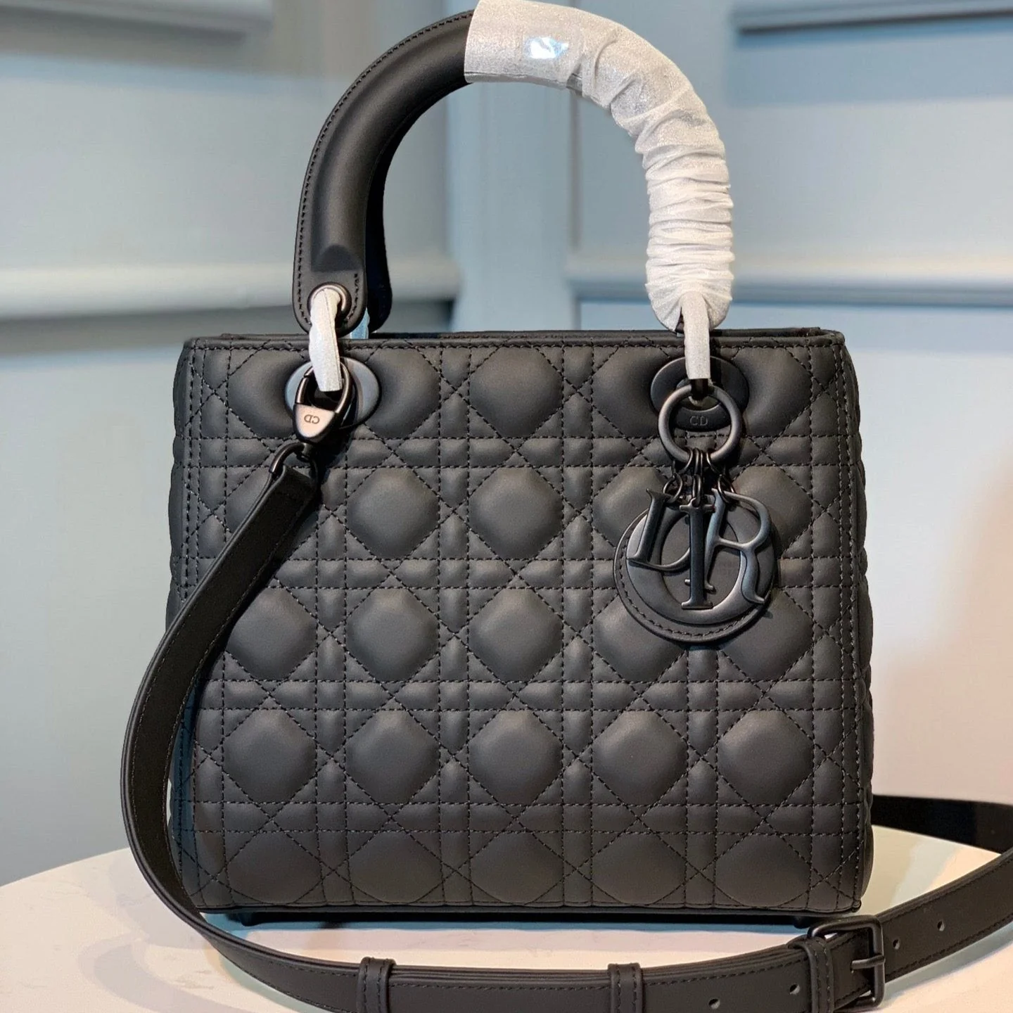 medium lady 24 black calfskin black hardware