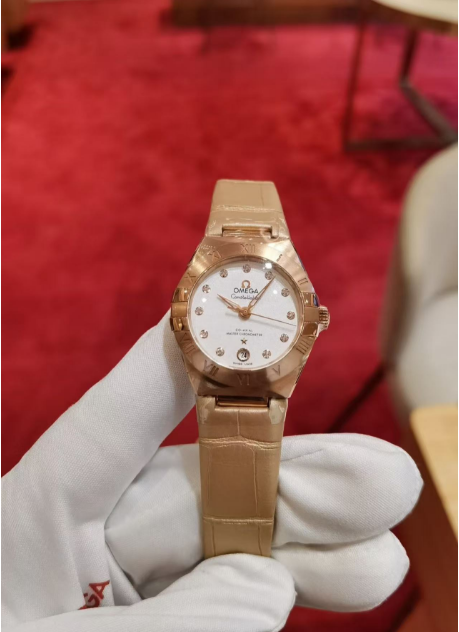 Omega Constellation Ladies' Selection 29mm  Sedna™ gold on leather strap 131.53.29.20.52.002