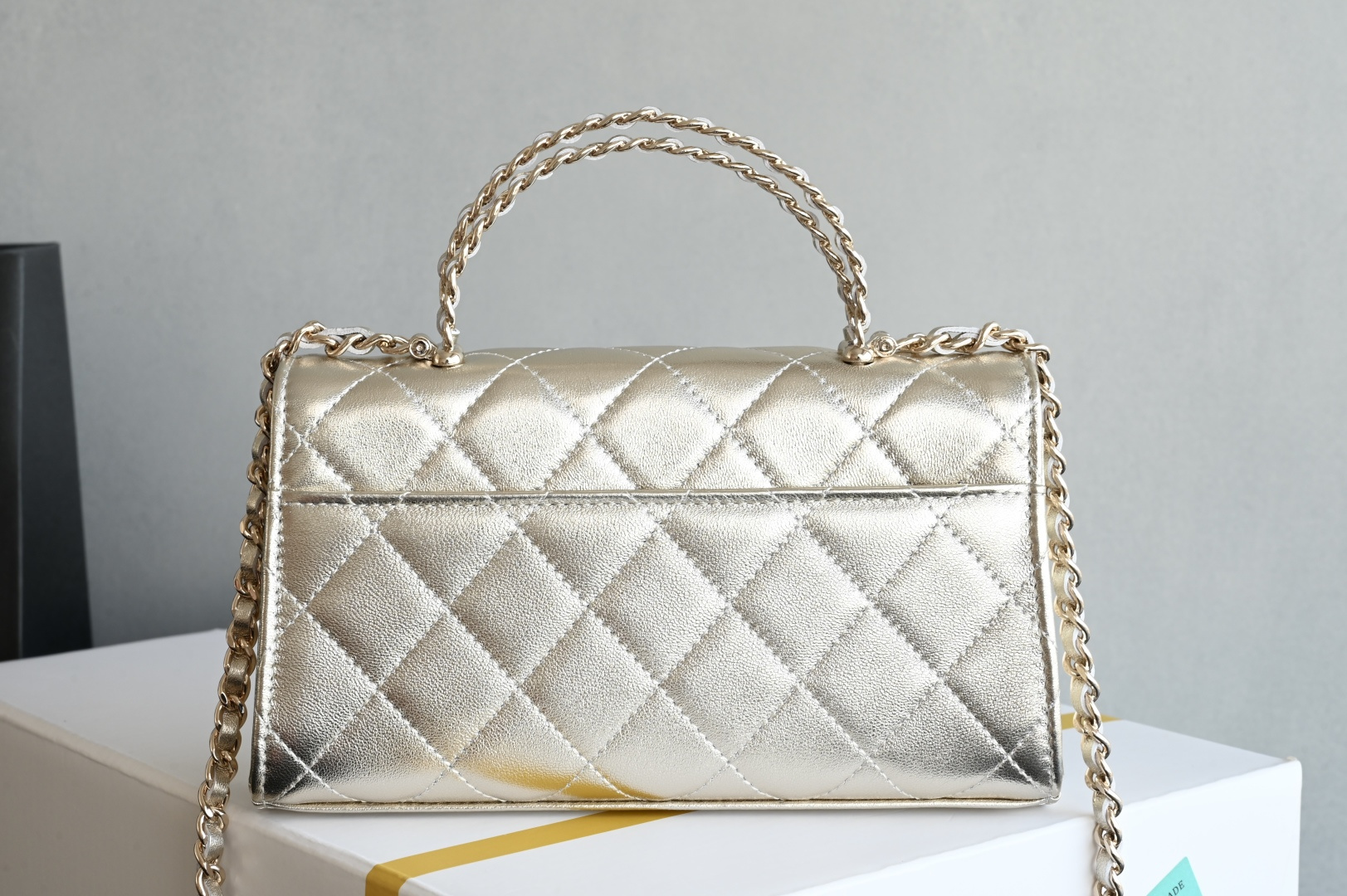 25S Top Handle Kelly Clutch with Chain in Metallic Gold Lambskin with Light Gold-Tone Hardware (Model AS4711)