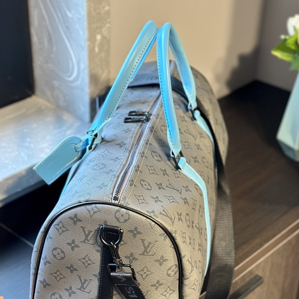 Louis Vuitton Keepall Bandoulière 45 Monogram Eclipse Reverse Coated Canvas Turquoise 45cm M11481
