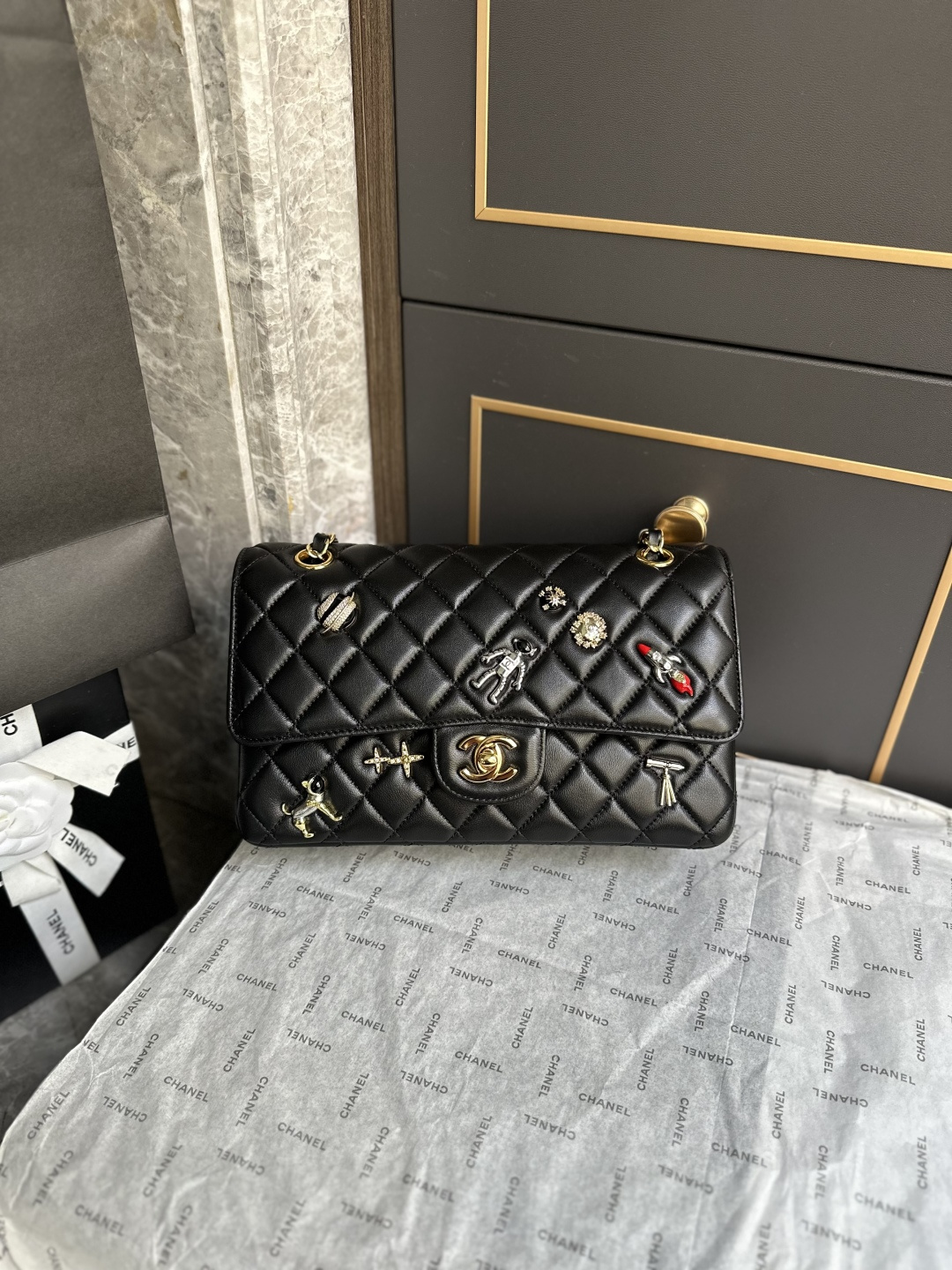 Spring-Summer 2026 Space Mission Limited Edition Black Quilted Lambskin Classic Flap Bag with Gold-Tone Hardware & Space Charms